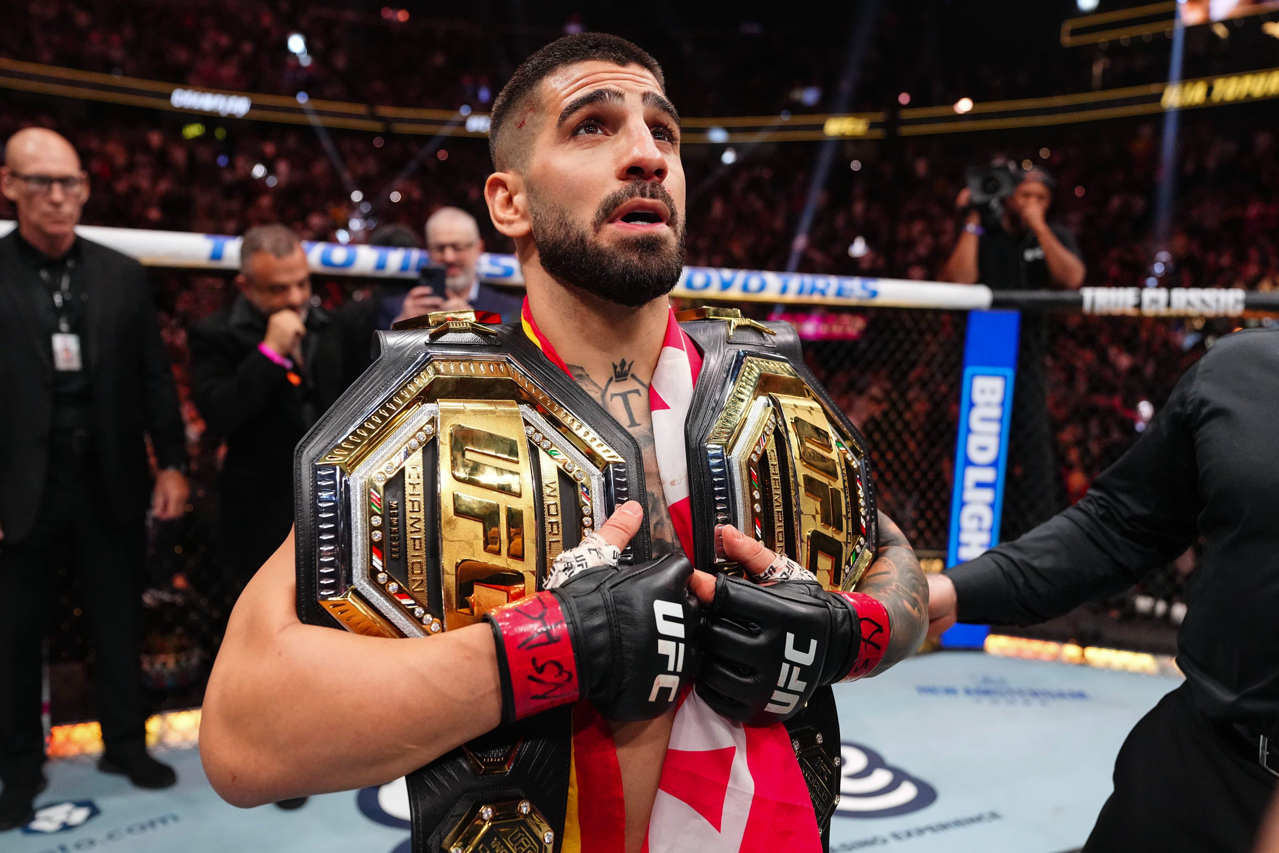 ilia-topuria-hold-his-two-belts-as-ufc-champion-36446-1774948509.jpeg