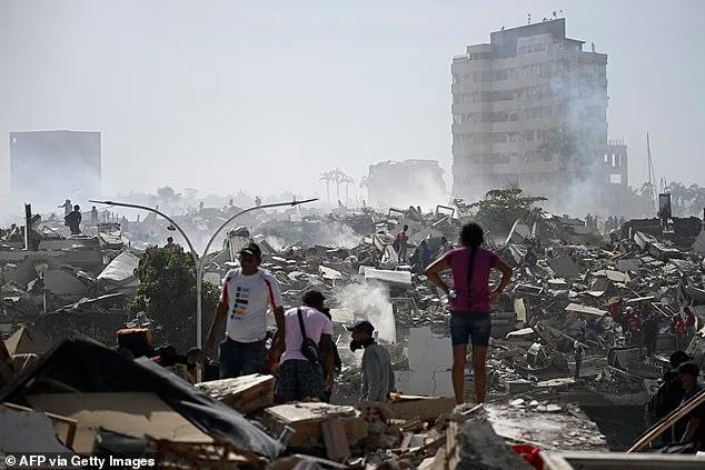 109620345-15933605-volunteers-search-for-possible-victims-in-a-collapsed-building-f-a-12-1782508554895-ezgifcom-avif-to-jpg-converter-40367-1782584444.jpg